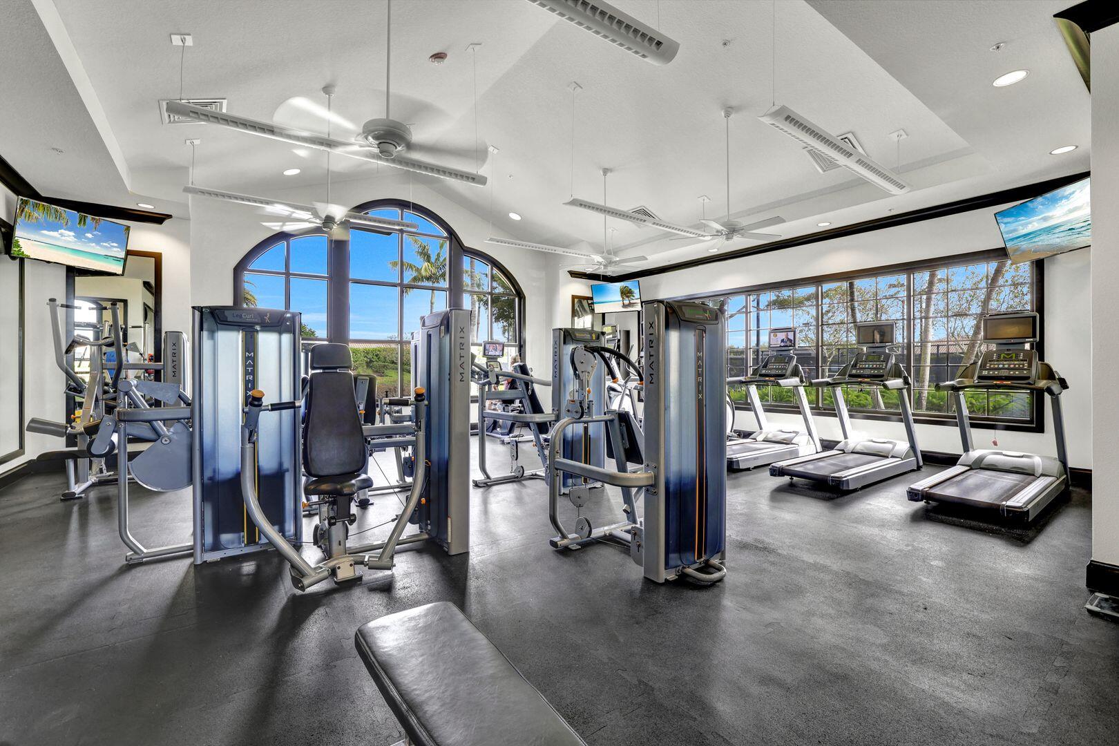 8581 Maggiore Court Naples, FL 34114 - Photo 18 of 33 a view of a room with gym equipment