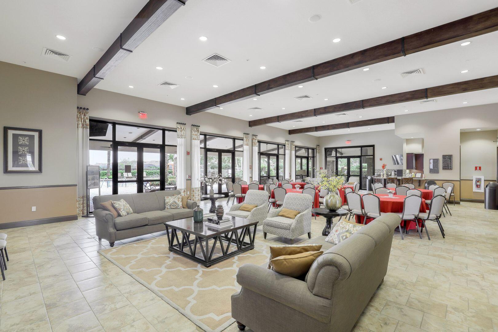 8581 Maggiore Court Naples, FL 34114 - Photo 20 of 33 a living room with furniture and a large window