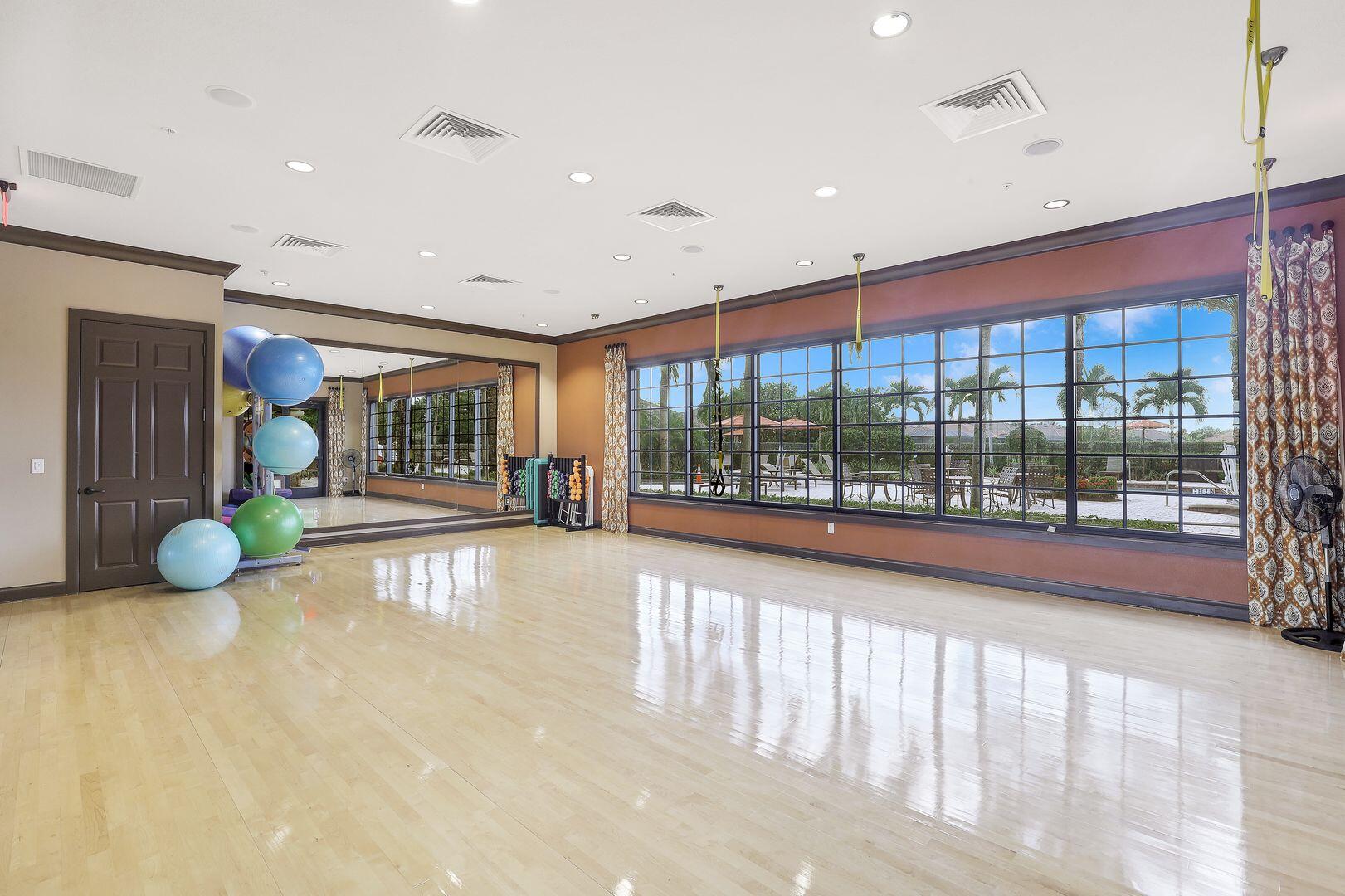 8581 Maggiore Court Naples, FL 34114 - Photo 21 of 33 a view of an entryway with a floor to ceiling window