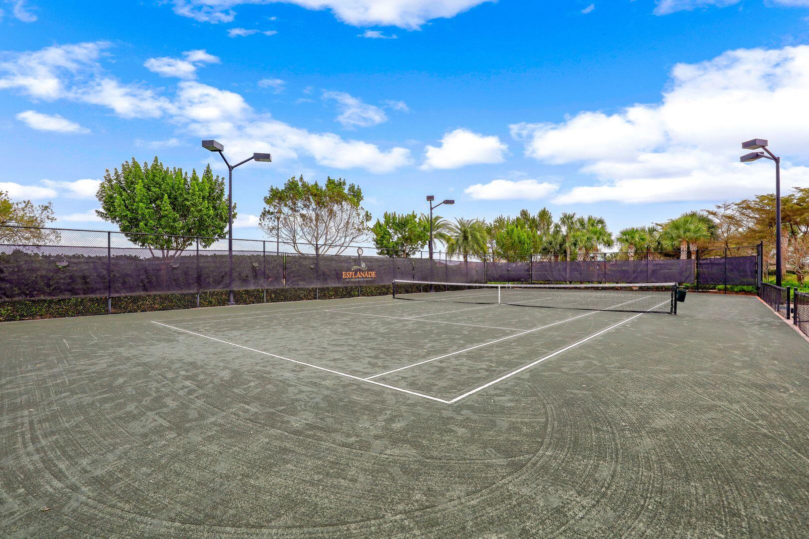 8581 Maggiore Court Naples, FL 34114 - Photo 23 of 33 a view of a tennis court