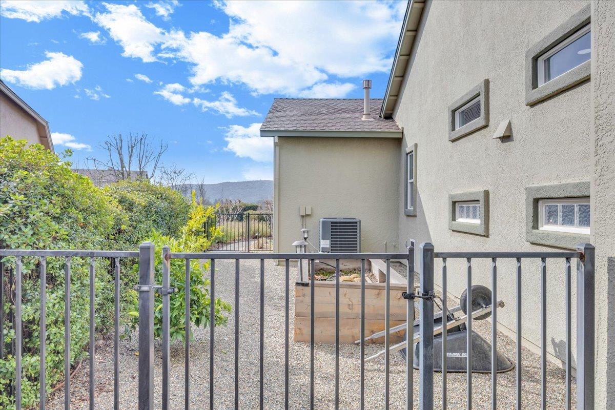 300 Rock Ridge Lane Copperopolis, CA 95228 - Photo 43 of 99 Separately fenced side-yard area for garden or pets.