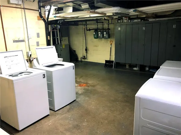 a utility room with dryer and washer