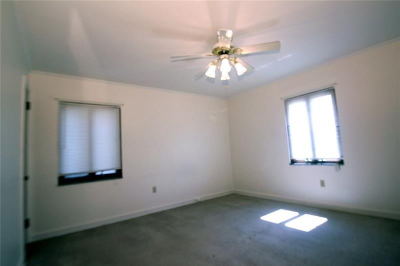 4513 Main Street, Unit 1 Homestead, PA 15120 - Photo 4 of 6 a view of empty room with window