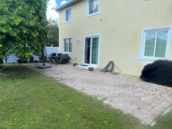 a view of a garden with a bench