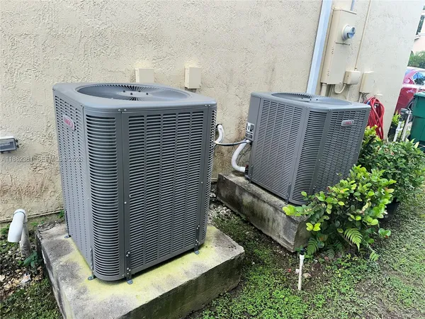 a bathroom with a granite countertop sink
