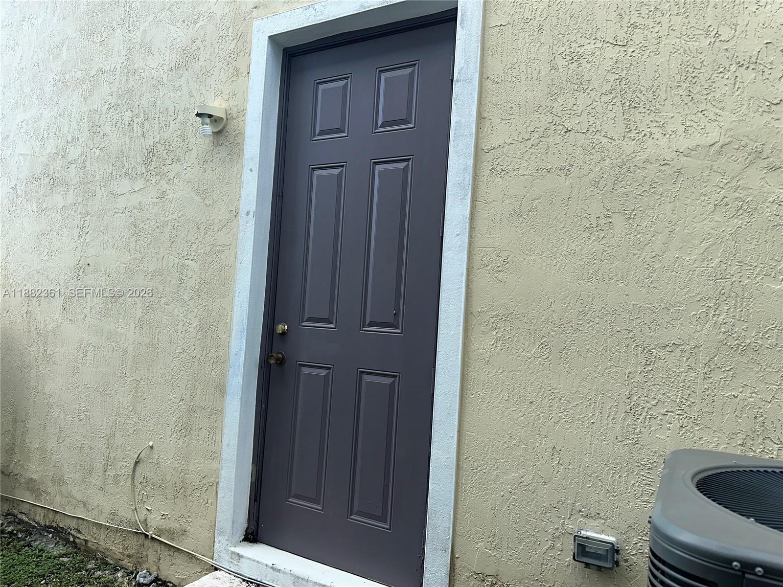 13986 Southwest 276th Way Homestead, FL 33032 - Photo 31 of 32 a bathroom with a granite countertop sink