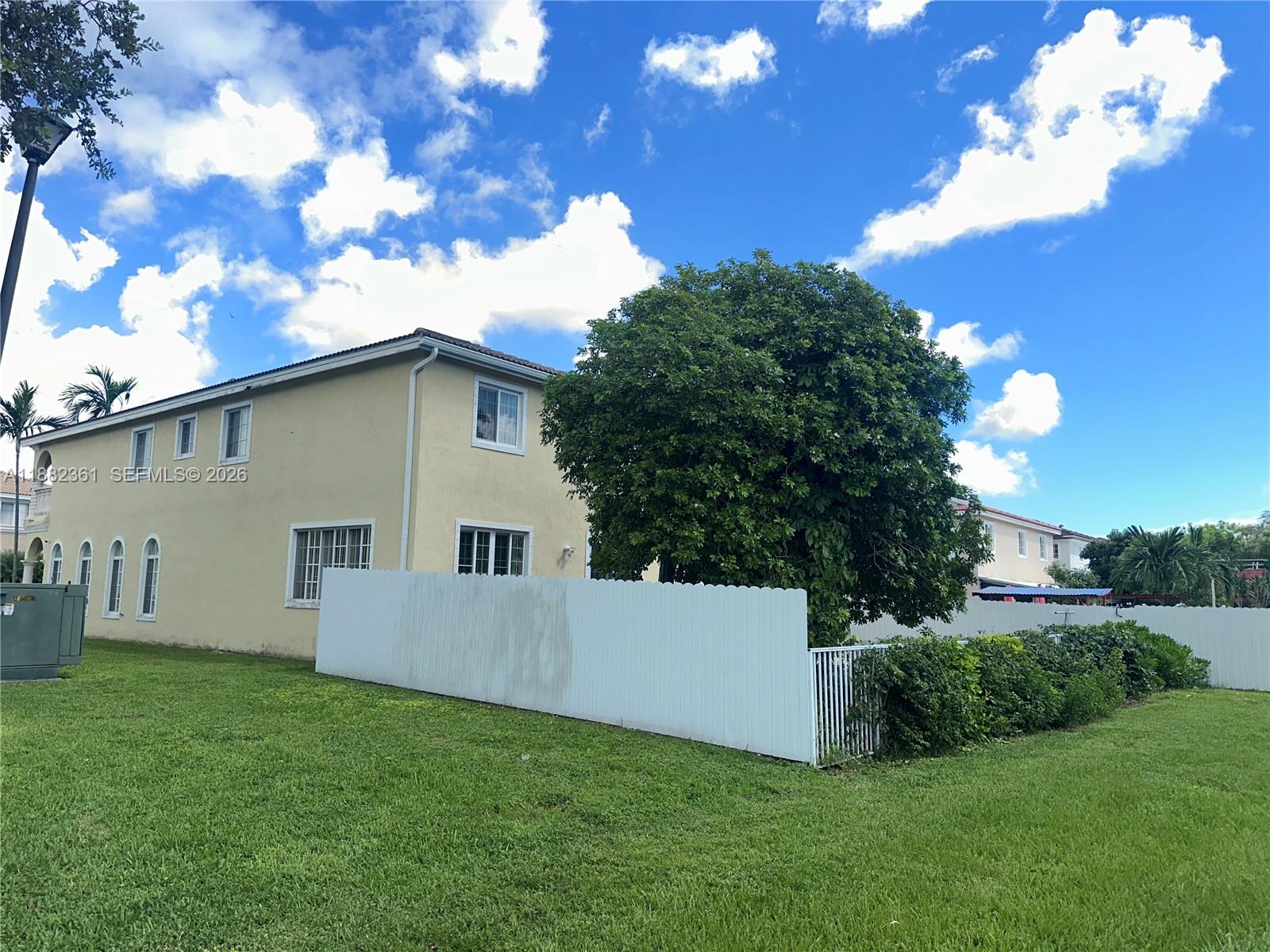 13986 Southwest 276th Way Homestead, FL 33032 - Photo 4 of 32 a view of a house with backyard