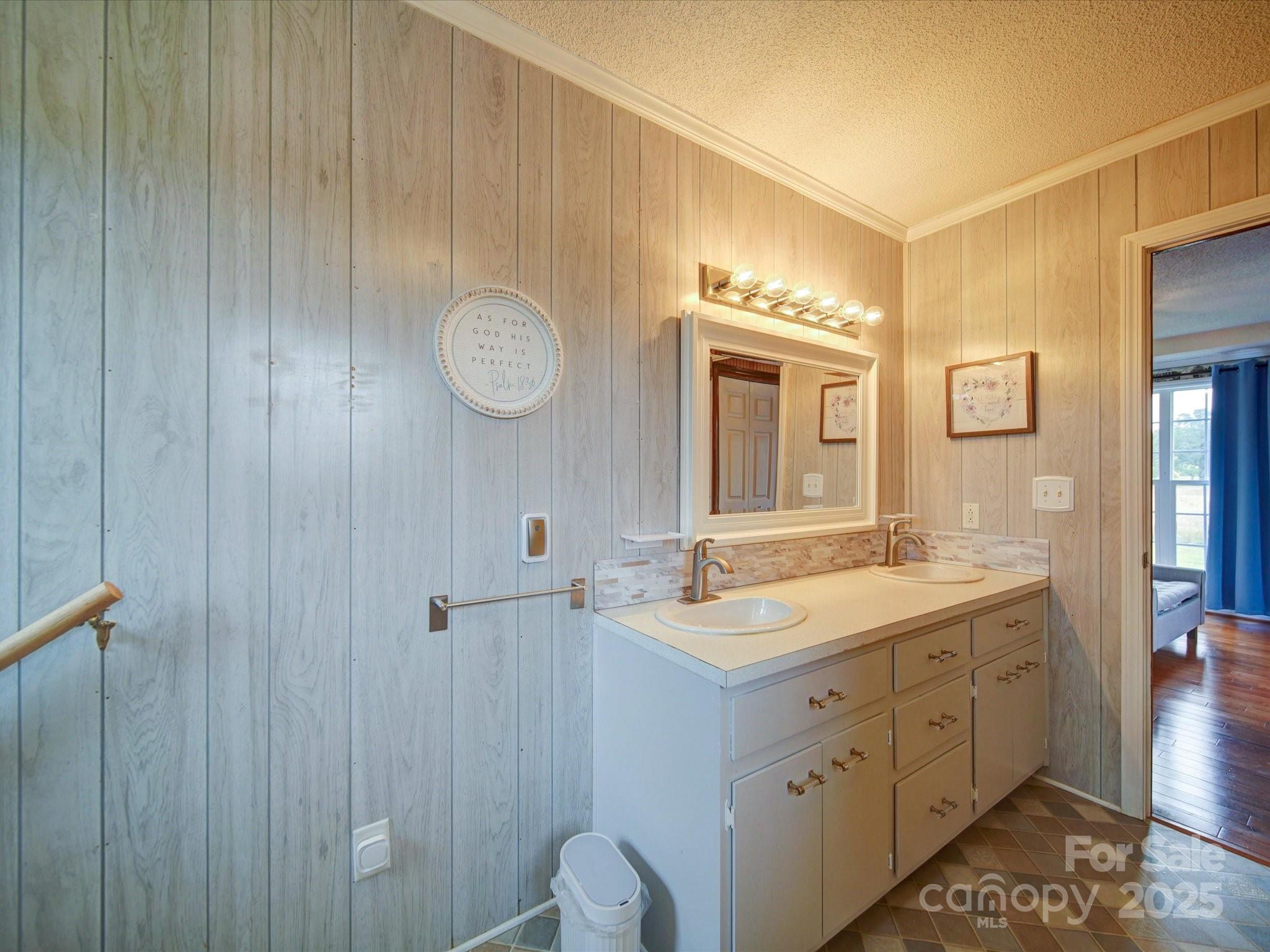 4115 Jenkins Road Marshville, NC 28103 - Photo 23 of 39 a spacious bathroom with a double vanity sink a mirror and shower