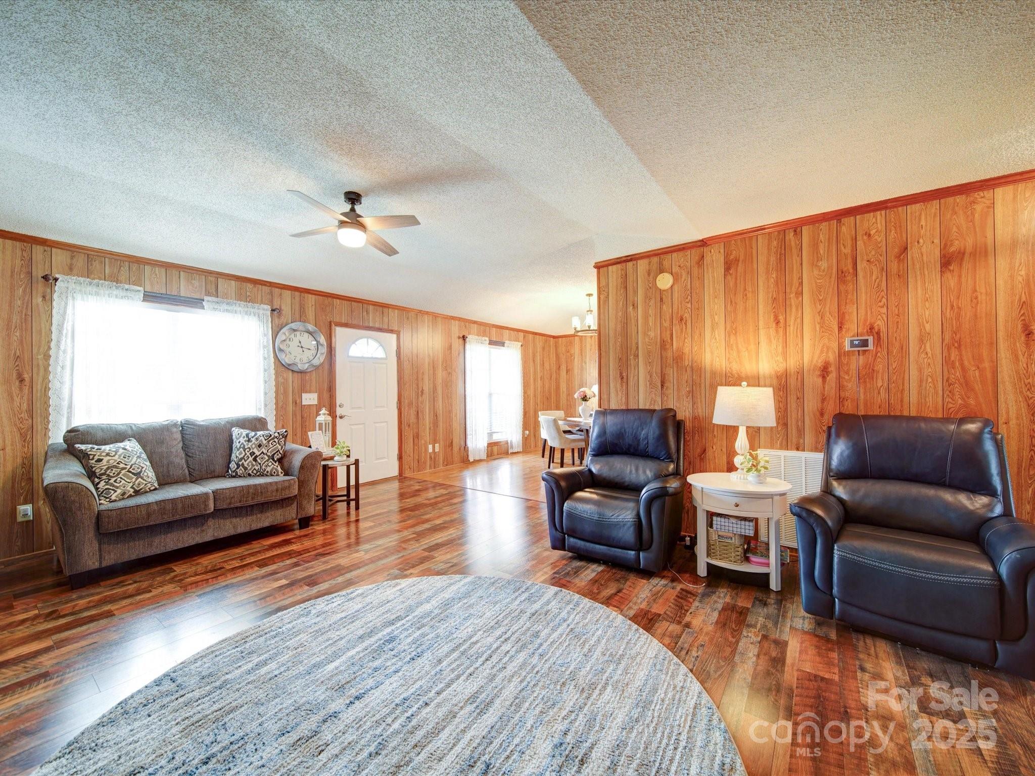 4115 Jenkins Road Marshville, NC 28103 - Photo 28 of 39 a living room with furniture and a large window