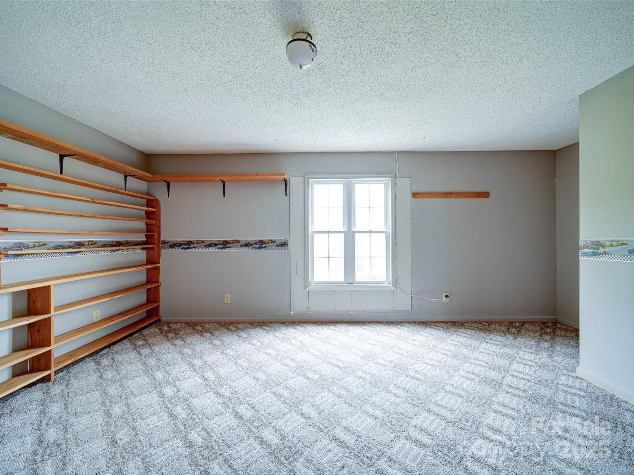 4115 Jenkins Road Marshville, NC 28103 - Photo 36 of 39 a view of an empty room with a window