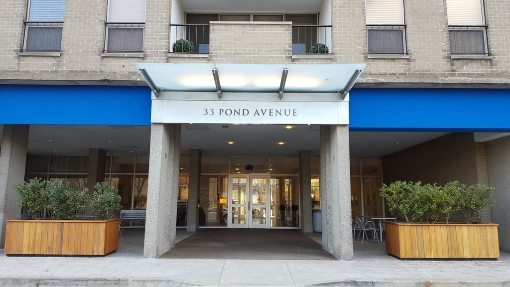 33 Pond Avenue, Unit 524 Brookline, MA 02445 - Photo 2 of 26 a view of a building with entryway