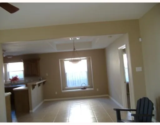 a kitchen with a sink and a window