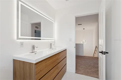 a view of an empty room with closet