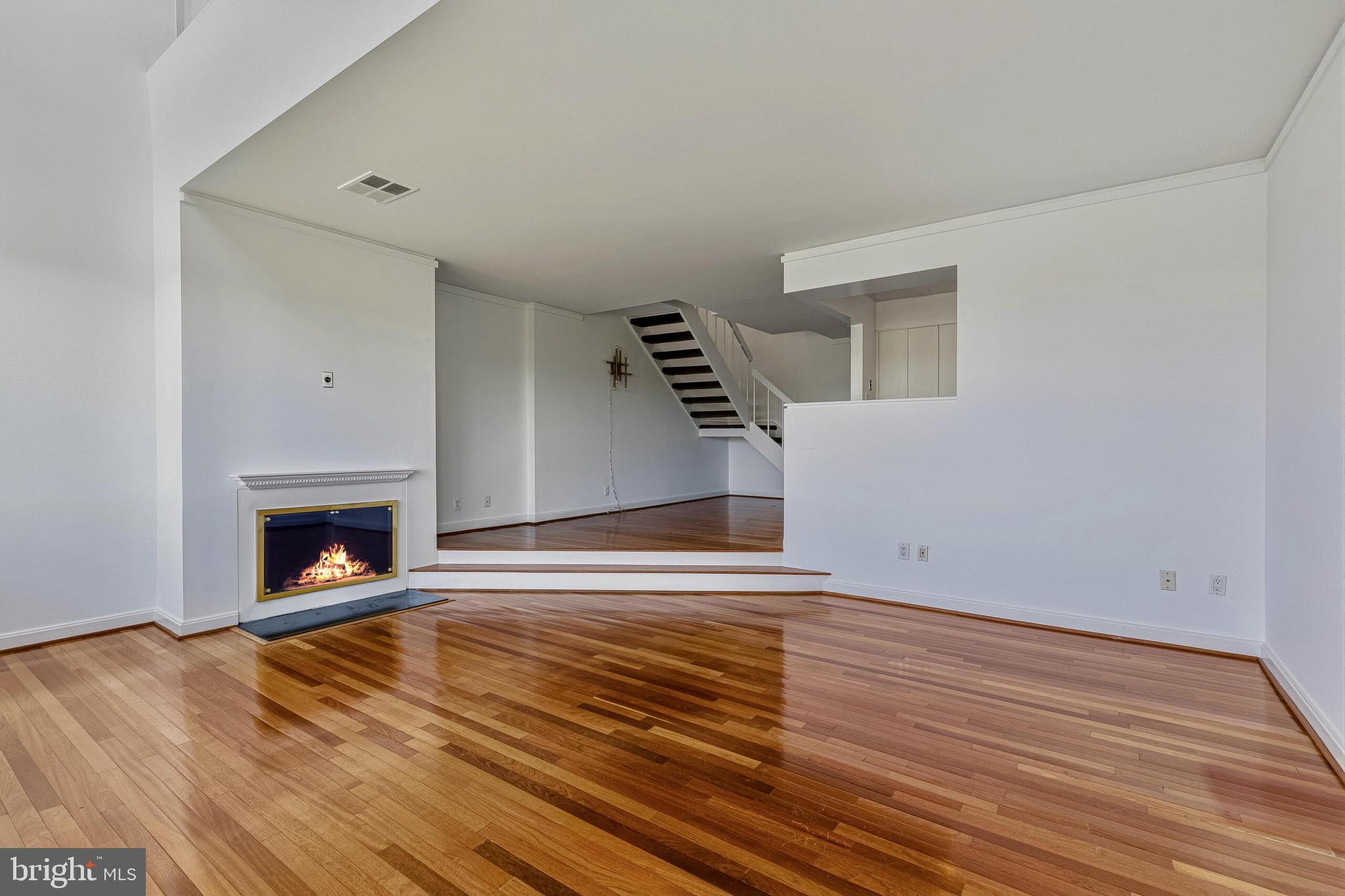2501 M Street Northwest, Unit 722 Washington, DC 20037 - Photo 3 of 26 Spacious Living Room with Fireplace