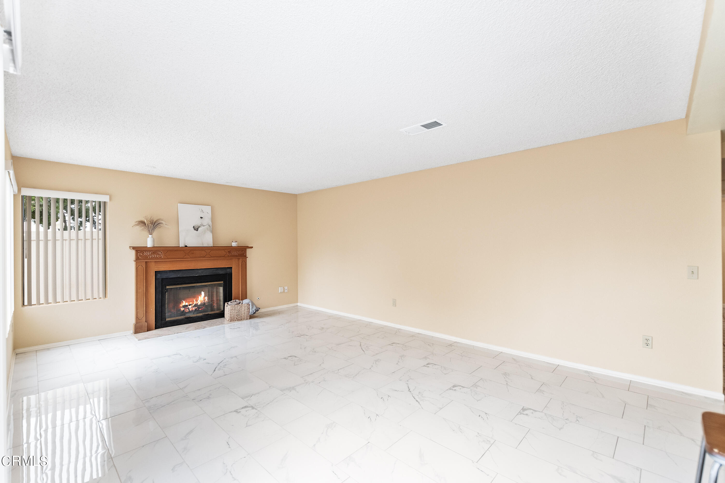 3510 Olds Road Oxnard, CA 93033 - Photo 11 of 36 a view of livingroom with a fireplace