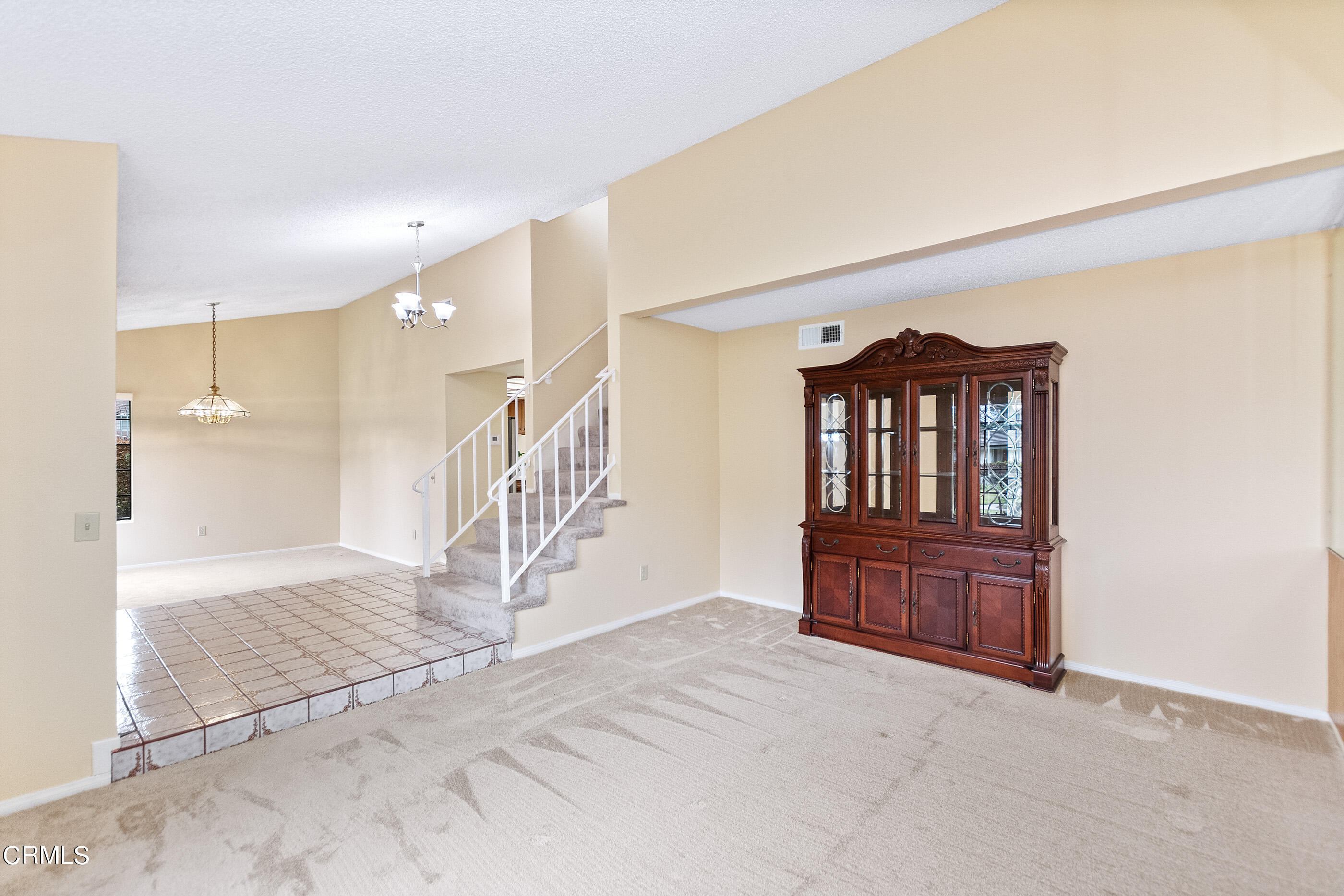 3510 Olds Road Oxnard, CA 93033 - Photo 16 of 36 an empty room with staircase and windows