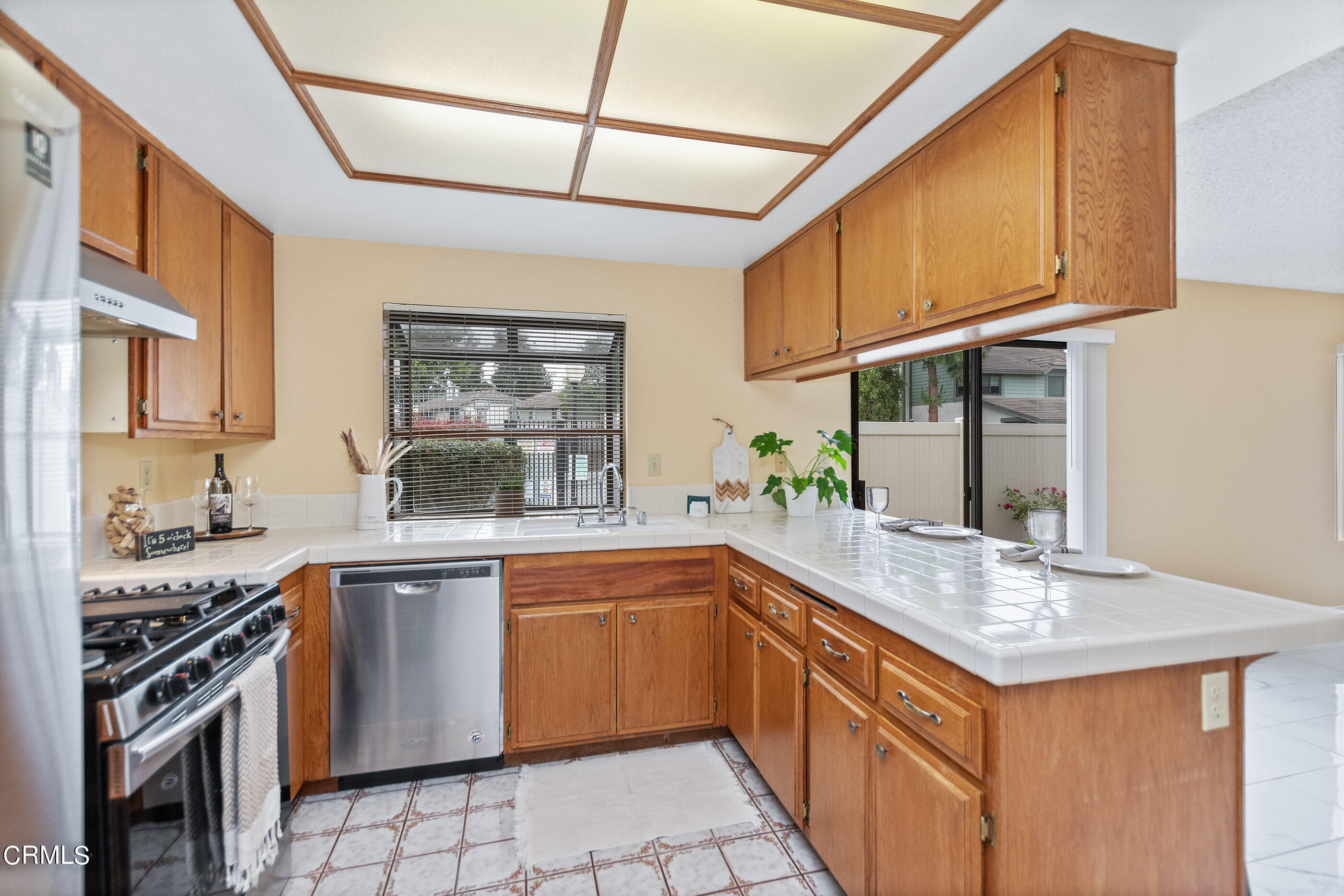 3510 Olds Road Oxnard, CA 93033 - Photo 9 of 36 a kitchen with a sink stove and microwave