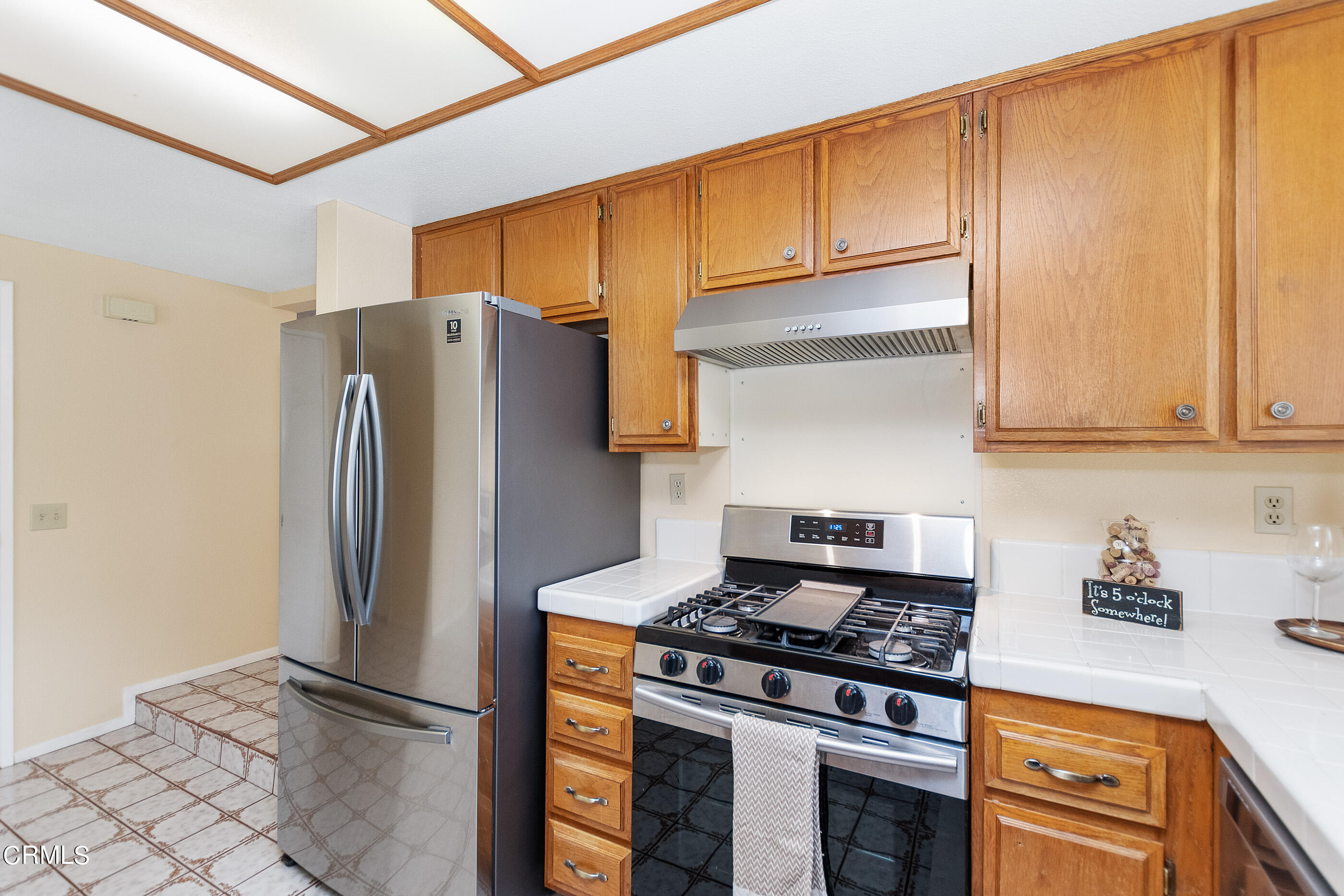 3510 Olds Road Oxnard, CA 93033 - Photo 10 of 36 a kitchen with stainless steel appliances granite countertop a refrigerator stove and sink