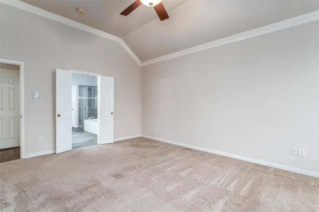 a view of a big room with closet and window