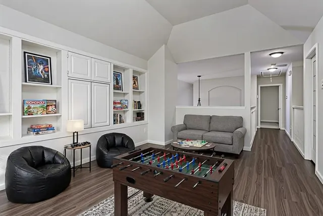 a living room with furniture and a couch