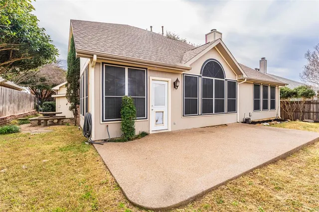 a view of swimming pool with an outdoor seating