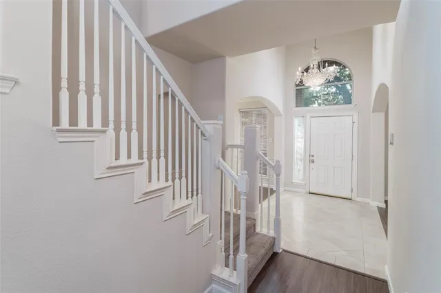 a view of entryway with wooden floor