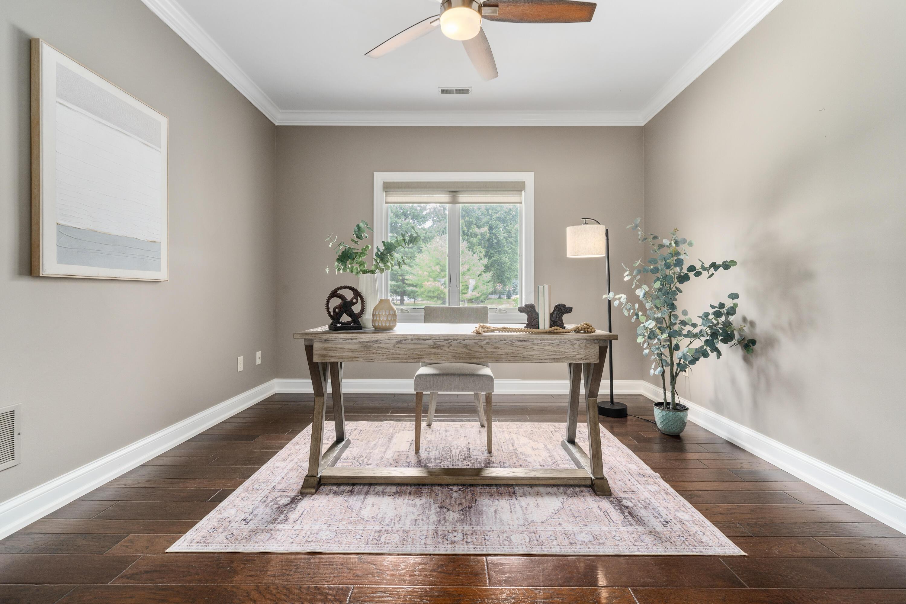4640 Maynard Road Delaware, OH 43015 - Photo 43 of 91 Spacious room featuring rich wood-finish flooring, a large window, a ceiling fan, crown molding, and neutral wall tones