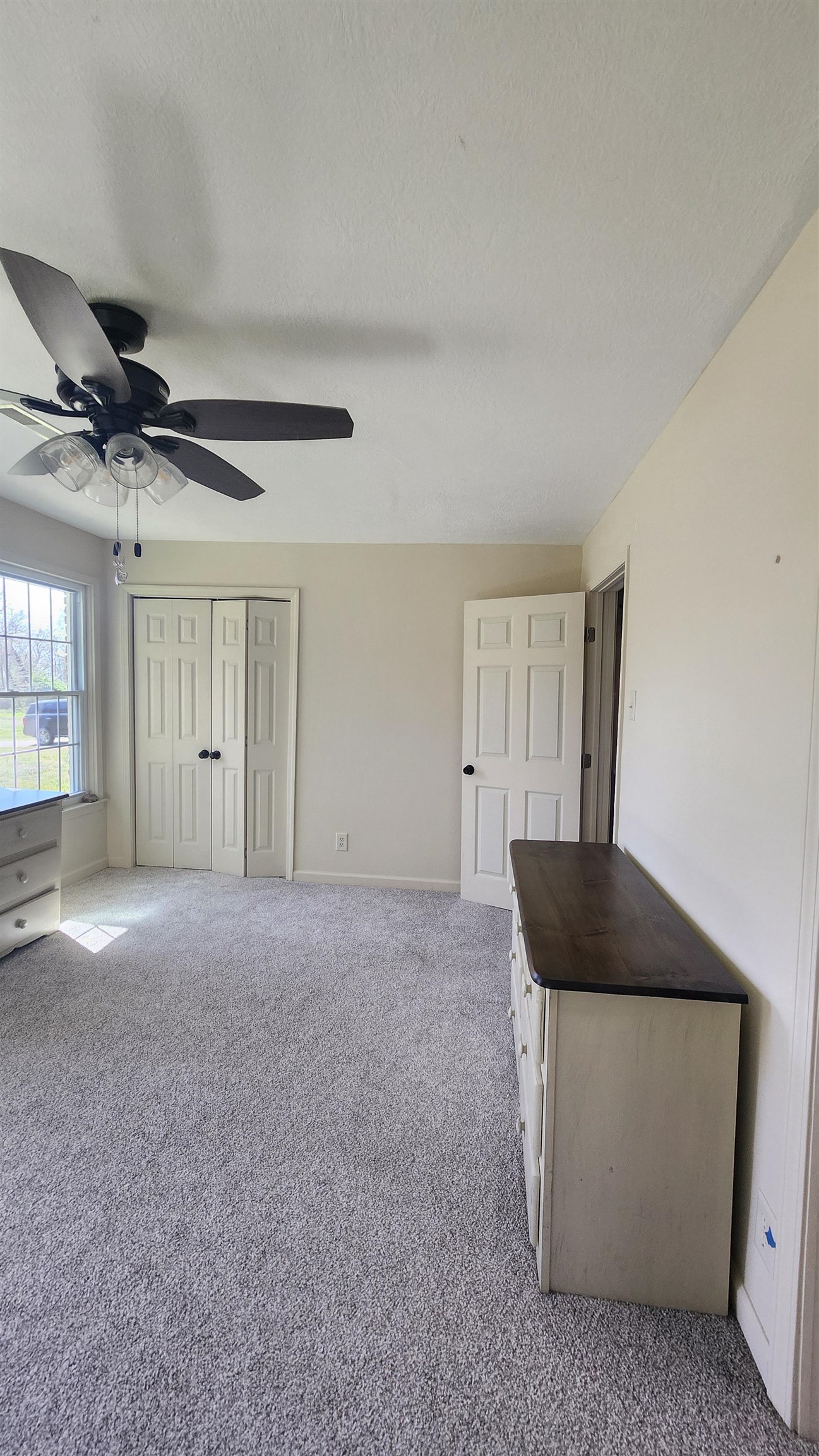 3226 19th Highway West Ripley, TN 38063 - Photo 8 of 18 a living room with furniture and a window