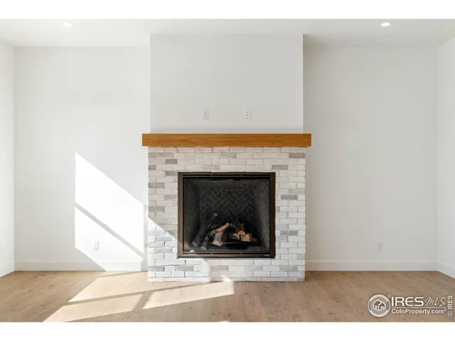 a white building with a fireplace