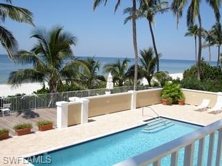 a view of a house with a swimming pool