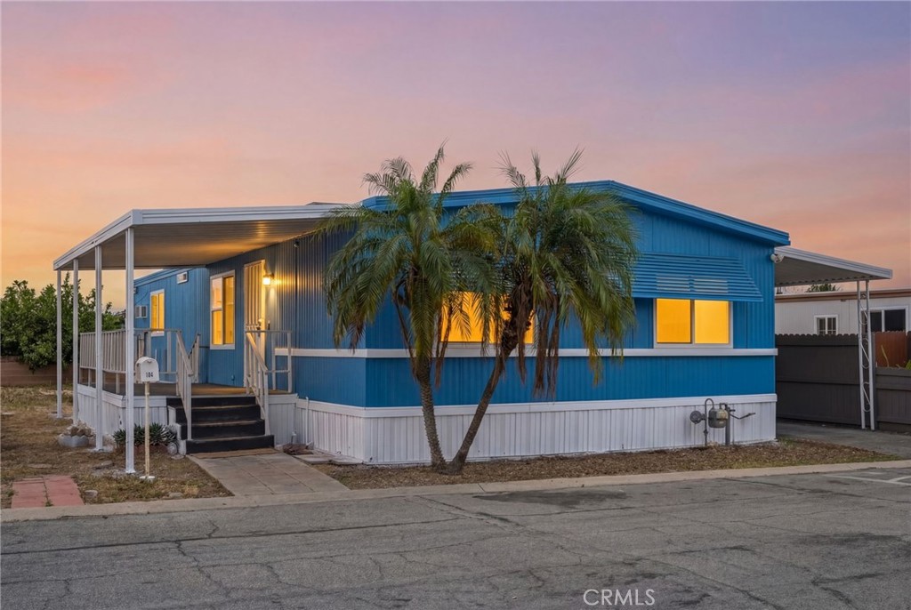 2250 West Mill Street, Unit 104 Colton, CA 92324 - Photo 1 of 28 a house view with a garden space