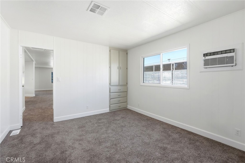 2250 West Mill Street, Unit 104 Colton, CA 92324 - Photo 20 of 28 an empty room with windows