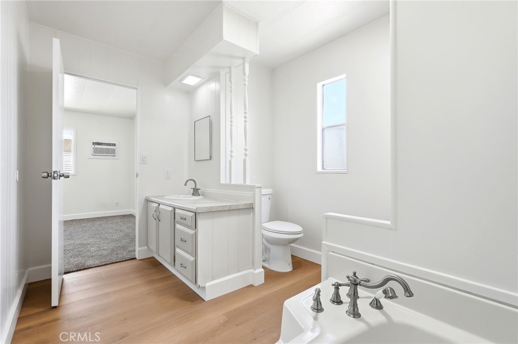 2250 West Mill Street, Unit 104 Colton, CA 92324 - Photo 23 of 28 a bathroom with a sink a toilet and shower