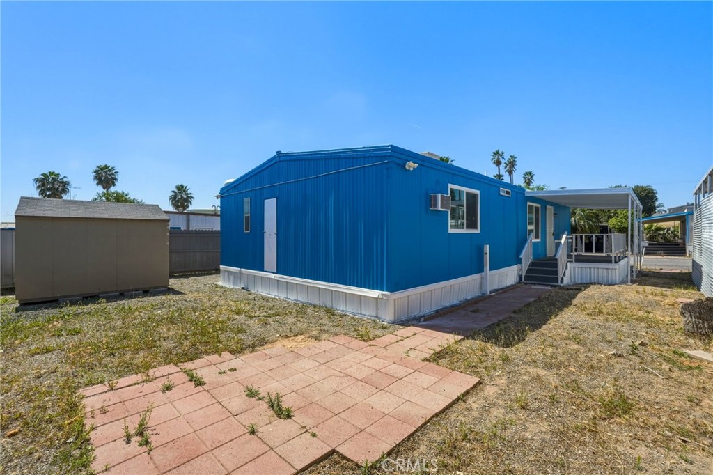 2250 West Mill Street, Unit 104 Colton, CA 92324 - Photo 27 of 28 a house view with a backyard space