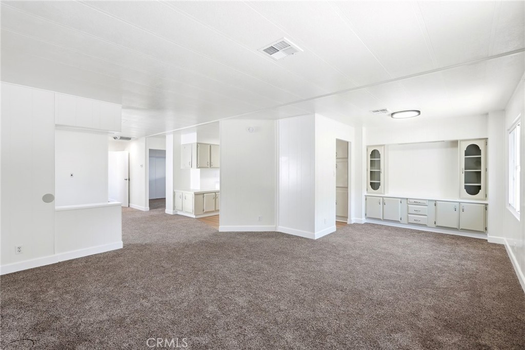 2250 West Mill Street, Unit 104 Colton, CA 92324 - Photo 10 of 28 a view of empty room with wooden floor