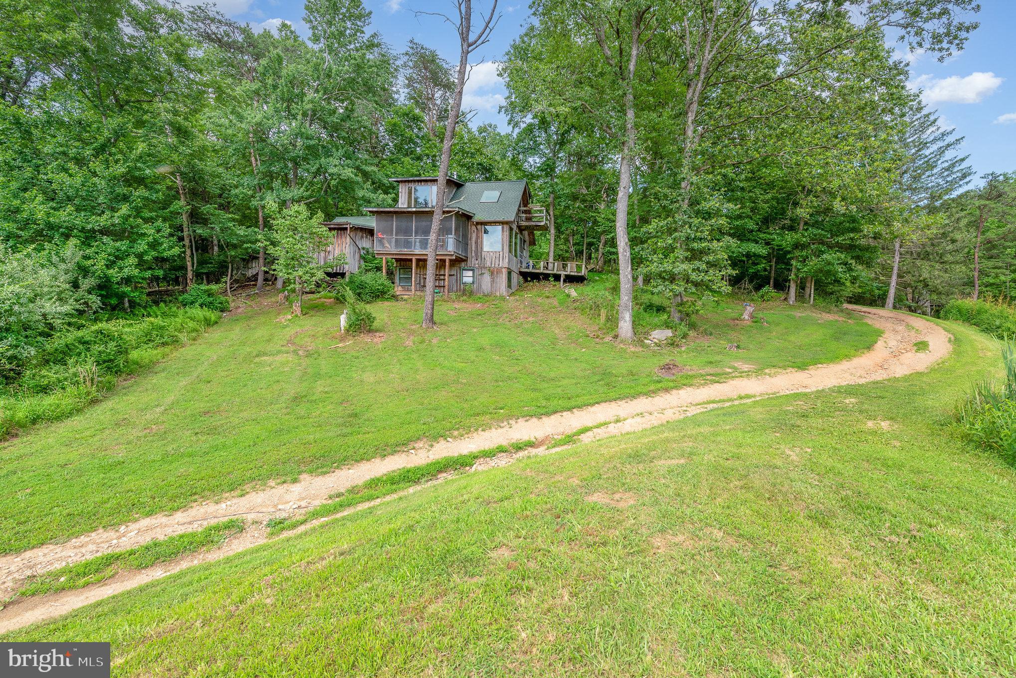 5330 Long Corner Road White Hall, MD 21161 - Photo 35 of 66 a view of a house with a backyard