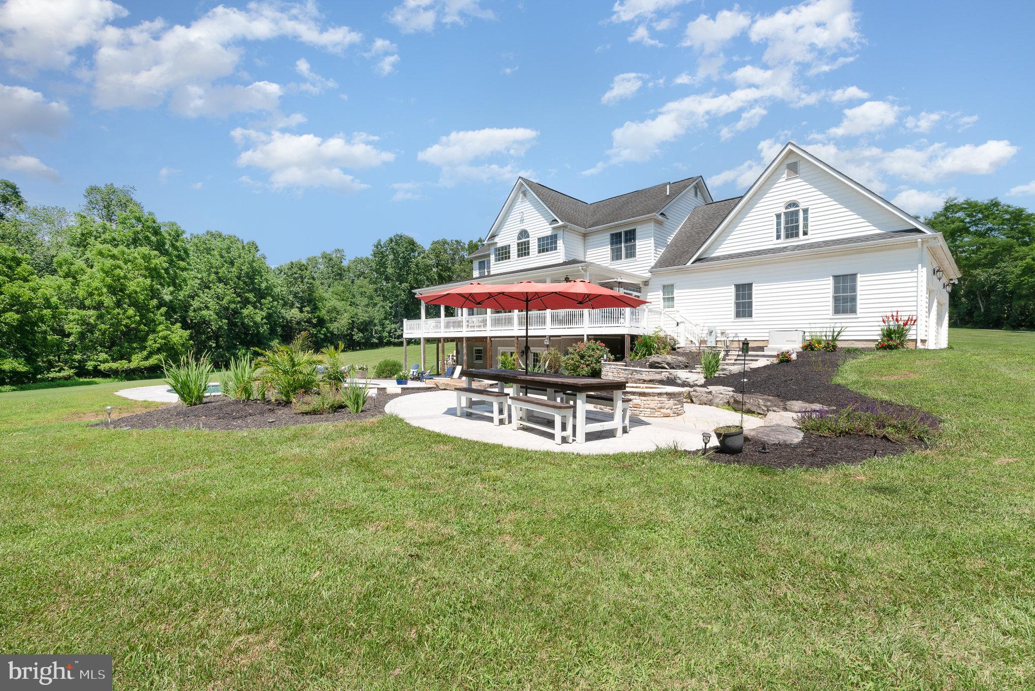 5330 Long Corner Road White Hall, MD 21161 - Photo 41 of 66 a view of a house with a yard porch and sitting area