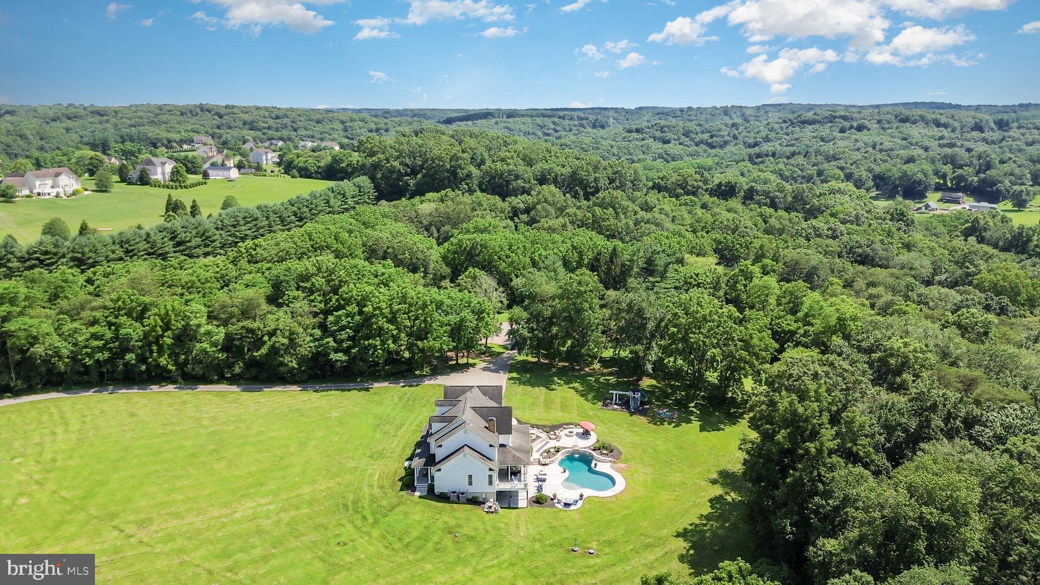 5330 Long Corner Road White Hall, MD 21161 - Photo 46 of 66 an aerial view of a residential houses with outdoor space and trees all around