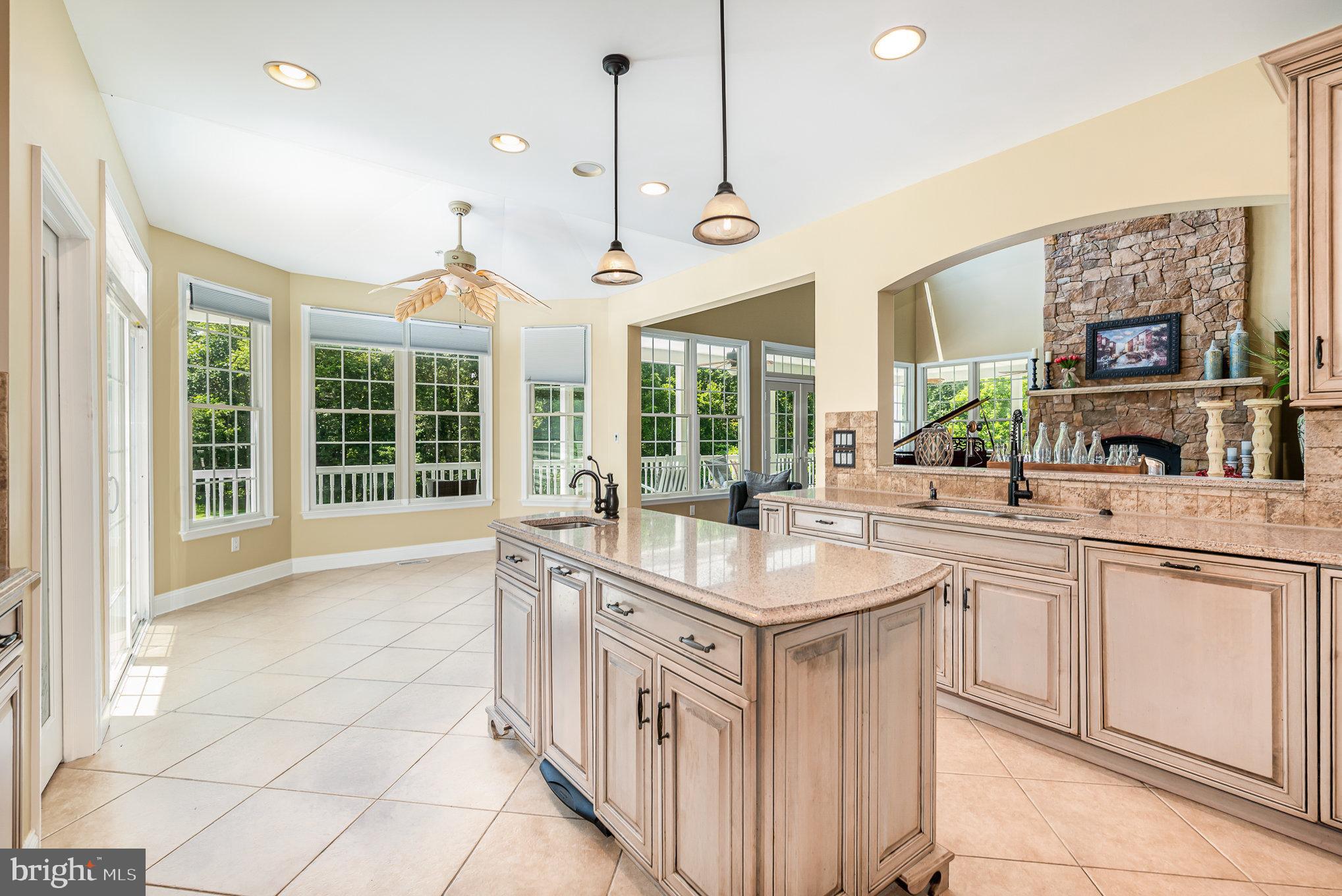 5330 Long Corner Road White Hall, MD 21161 - Photo 5 of 66 a kitchen with stainless steel appliances granite countertop a sink and a large window