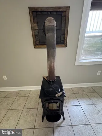 a close view of a stove in a bathroom