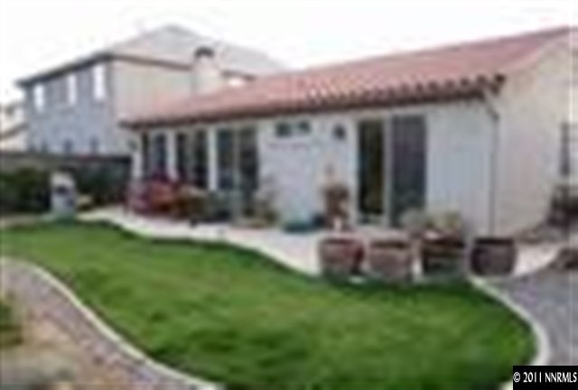 441 Alysheba Court Reno, NV 89521 - Photo 6 of 8 a view of a house with a yard