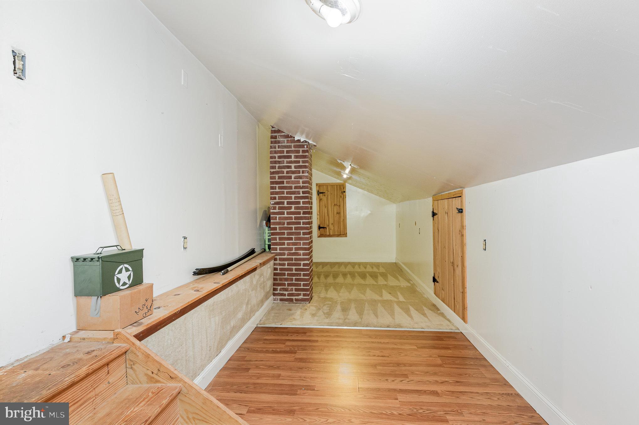 255 Lums Road North East, MD 21901 - Photo 20 of 27 a view of a room with wooden floor and staircase