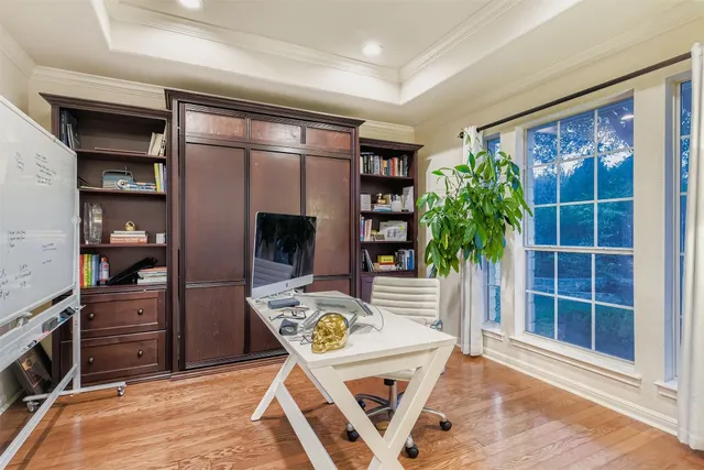 a view of a workspace with furniture