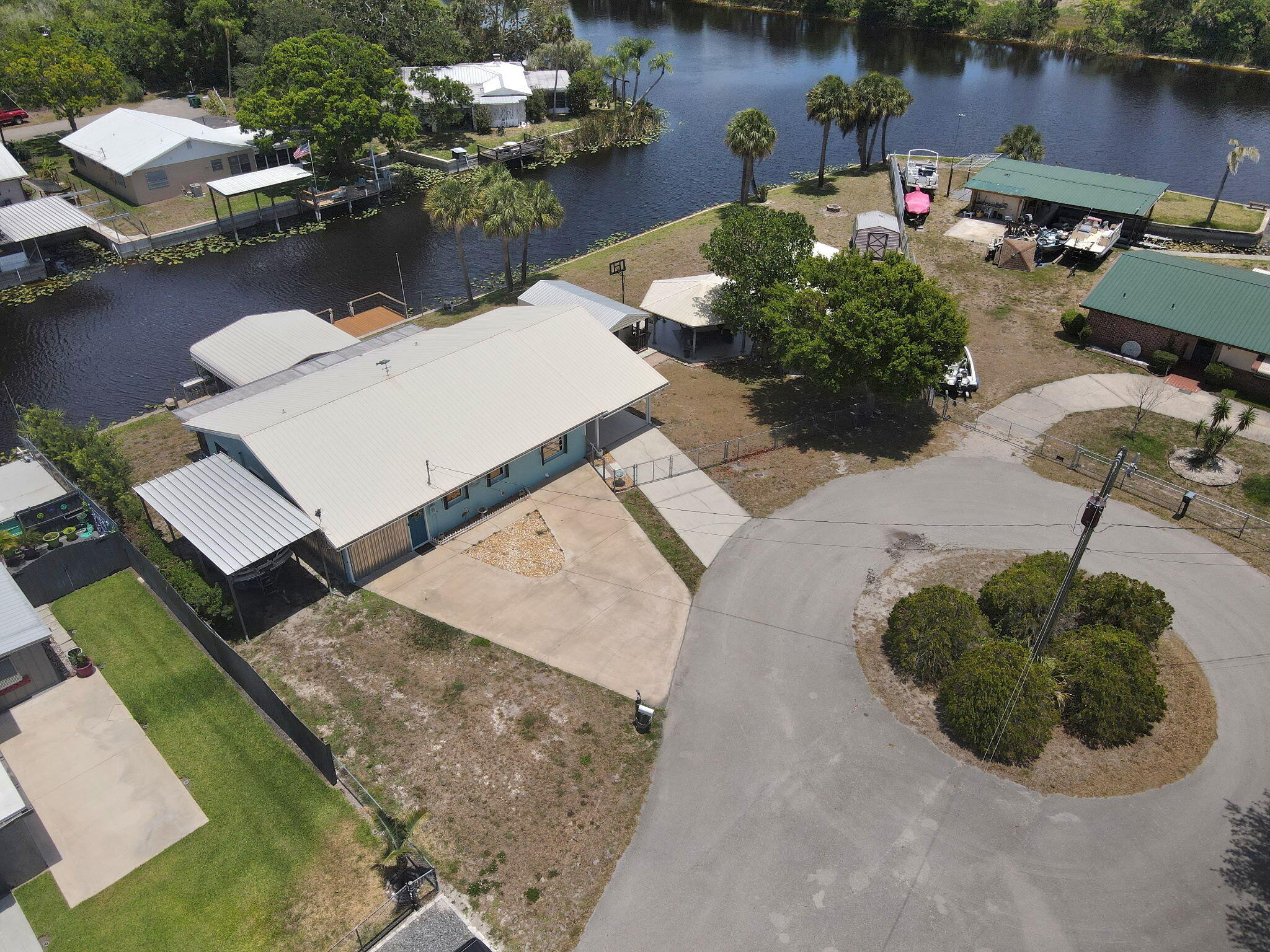 1115 Elm Street Okeechobee, FL 34974 - Photo 35 of 37 an aerial view of a house with outdoor space