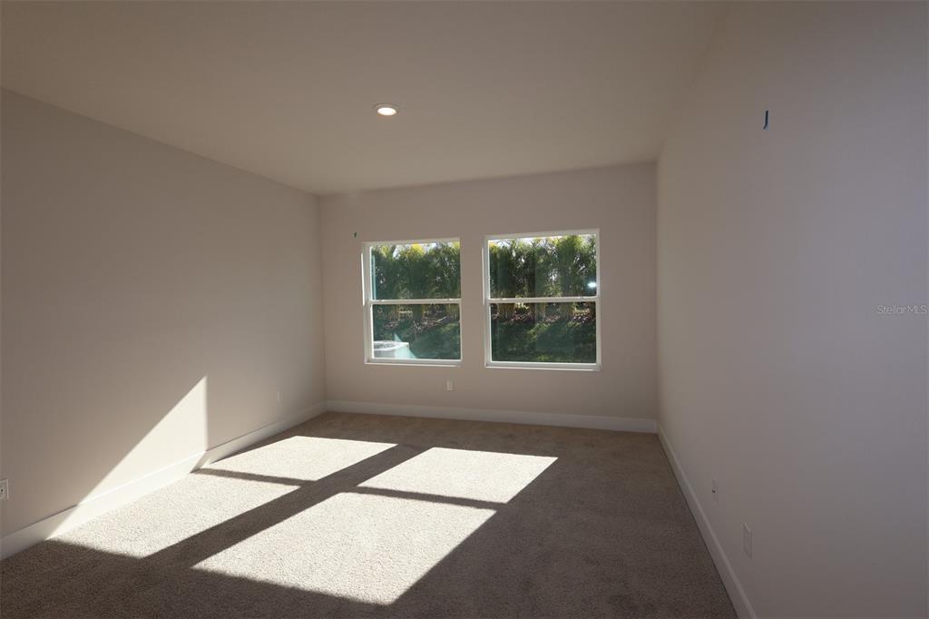 5263 Everlong Drive Apollo Beach, FL 33572 - Photo 11 of 18 a view of an empty room with a window