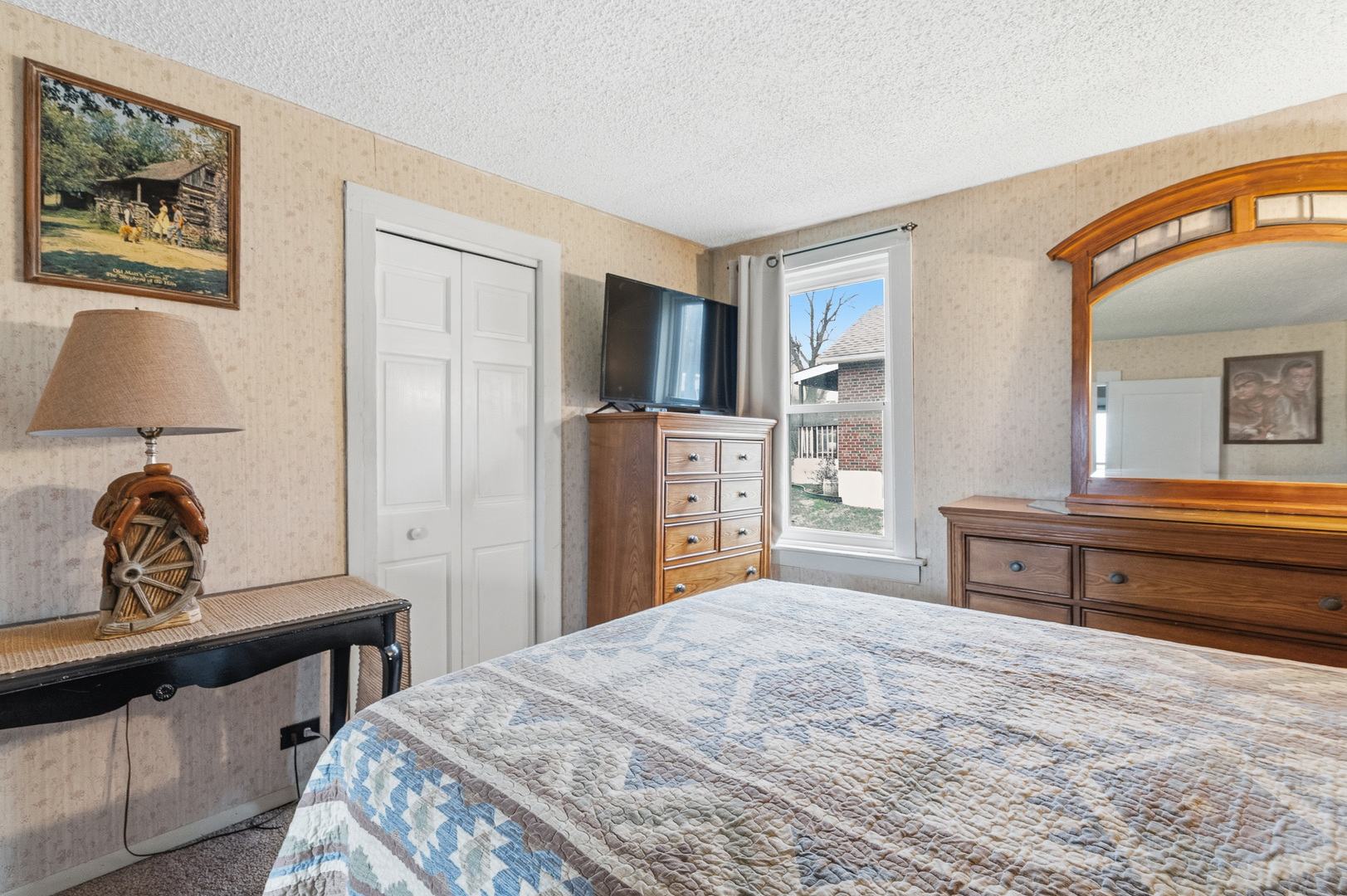 310 Godfrey Avenue Lockport, IL 60441 - Photo 16 of 65 a bedroom with a bed dresser and a window