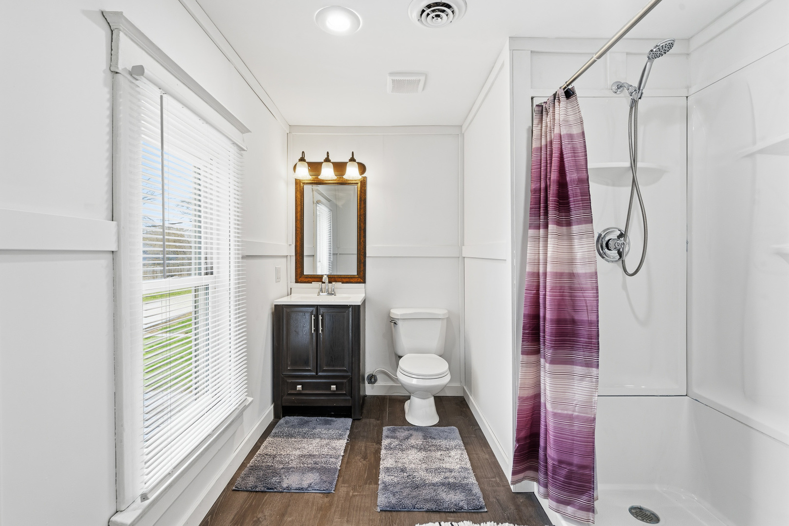 310 Godfrey Avenue Lockport, IL 60441 - Photo 20 of 65 a bathroom with a sink and a shower