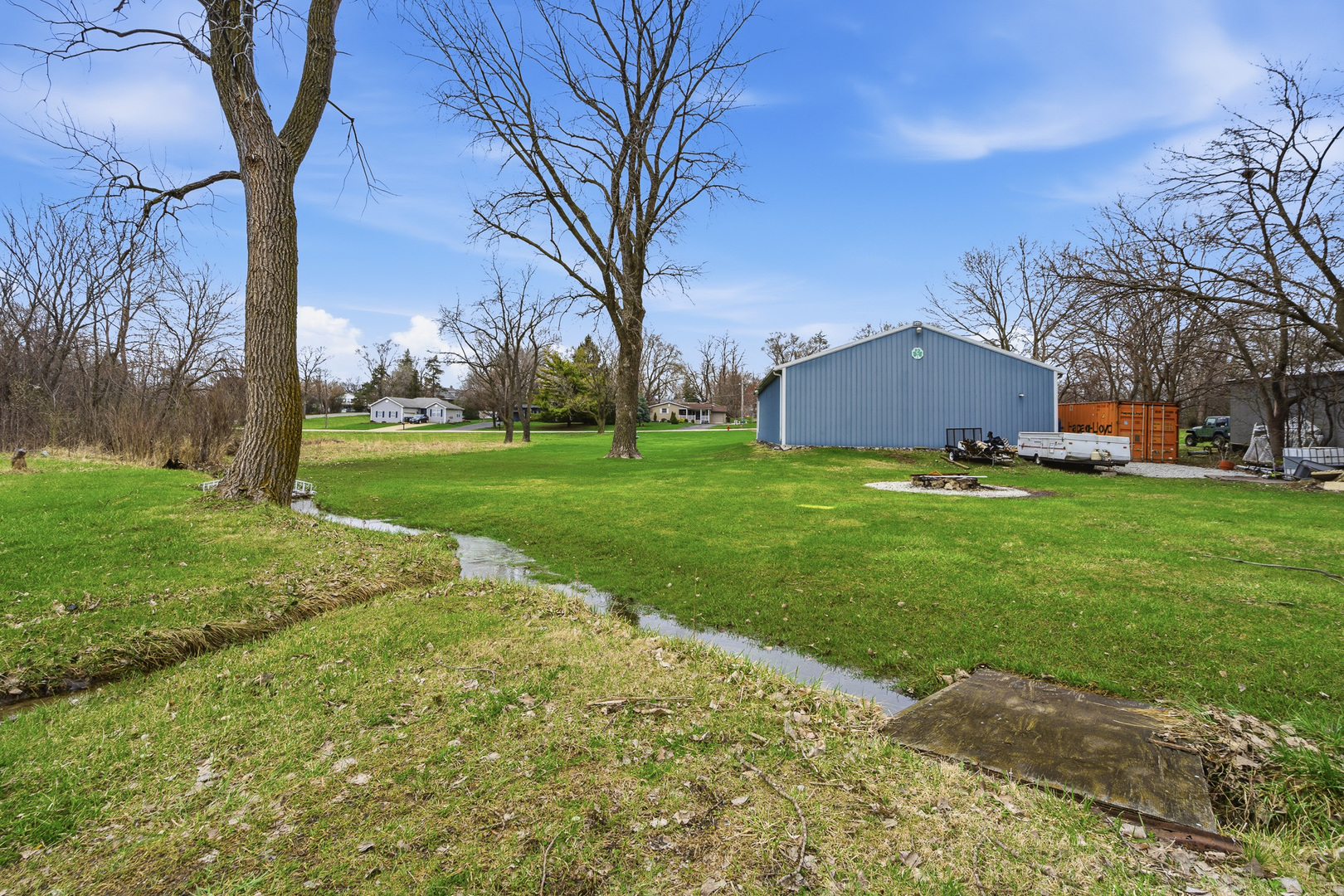 310 Godfrey Avenue Lockport, IL 60441 - Photo 40 of 65 a view of a backyard with large trees