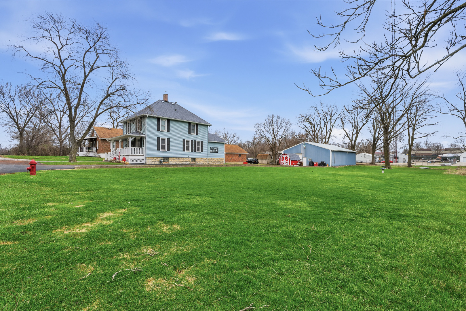 310 Godfrey Avenue Lockport, IL 60441 - Photo 61 of 65 a view of a building with a big yard with large trees