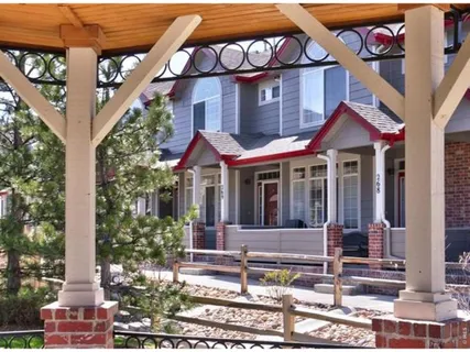 front view of a house with a small yard